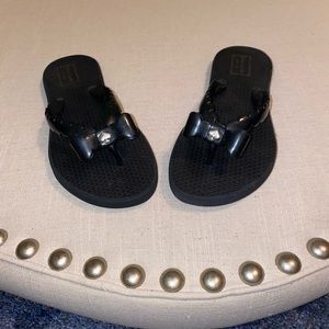 Never worn Kate spade black flip flops